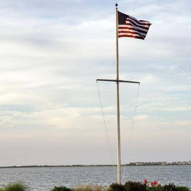Nautical flagpole by the water